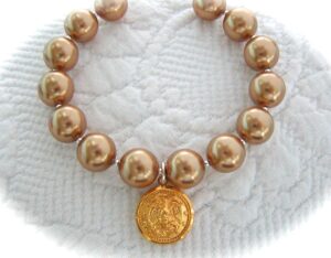 Pearl Strand Bracelet with Small Button Charm